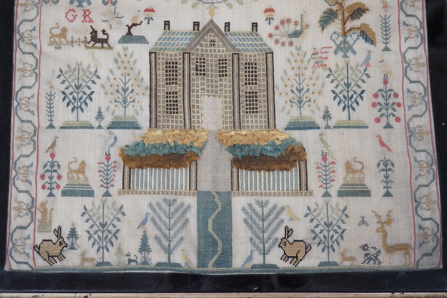 A George lll needlework sampler dated 1806, by Janet Brydon. Worked on fine linen, the sampler embroidered with ornate motifs of angels, birds, deer, lions and a castle around a short embroidered script; I ask not riches